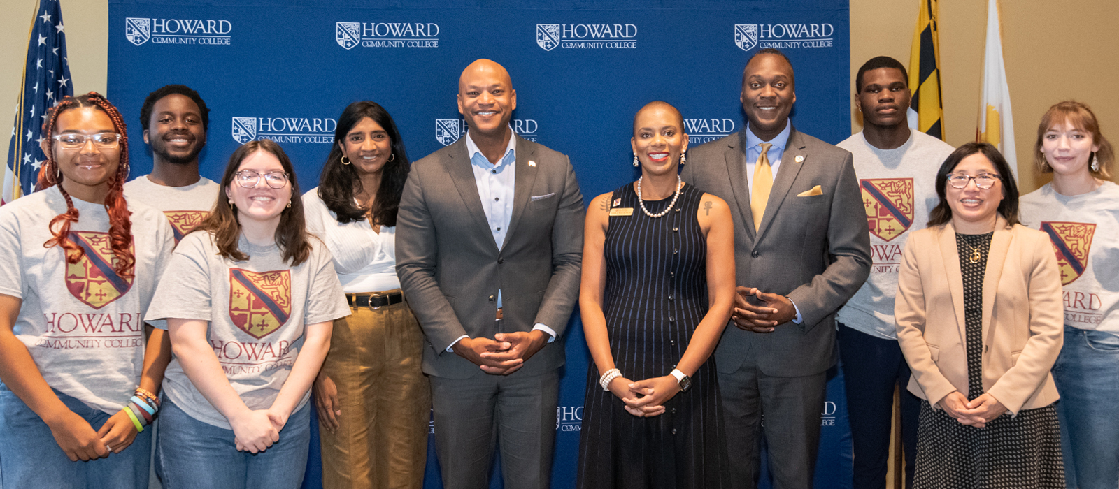 Photo of Daria Willis, Governor Moore, County Executive Calvin Ball and students