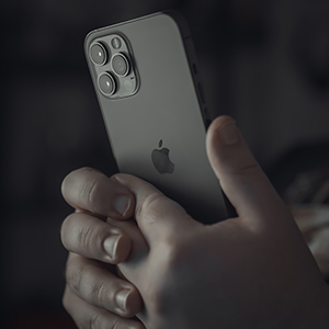 photo of two hands holding a cellphone