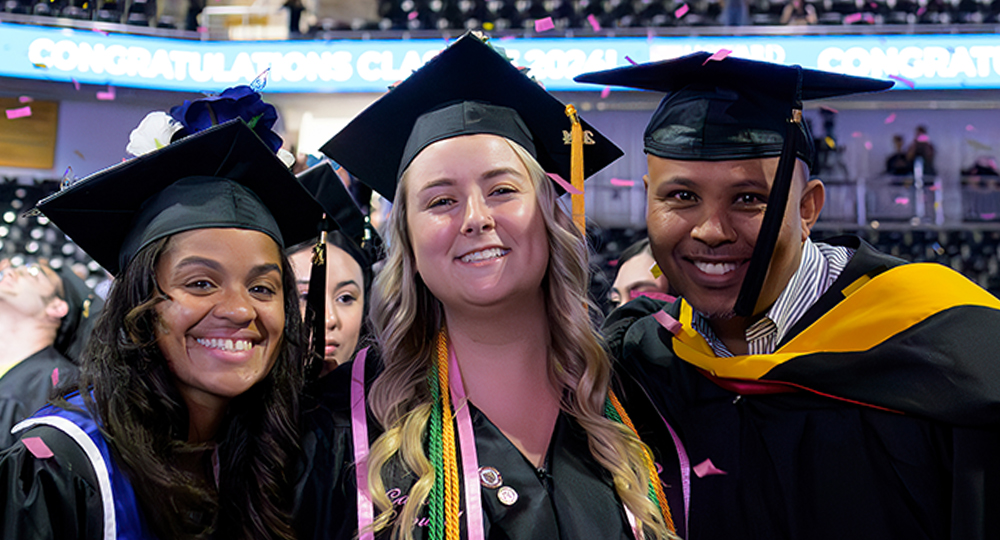 Three HCC graduates on commencement day