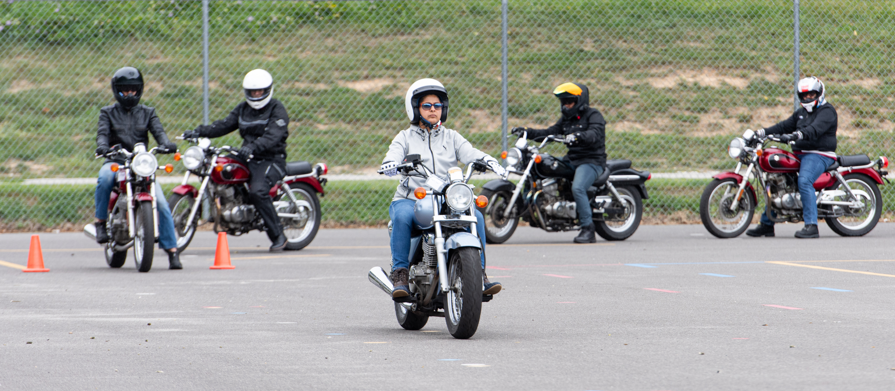 Rider School motorcycle class members riding on the range.