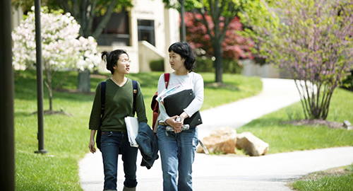 elc students walking on campus