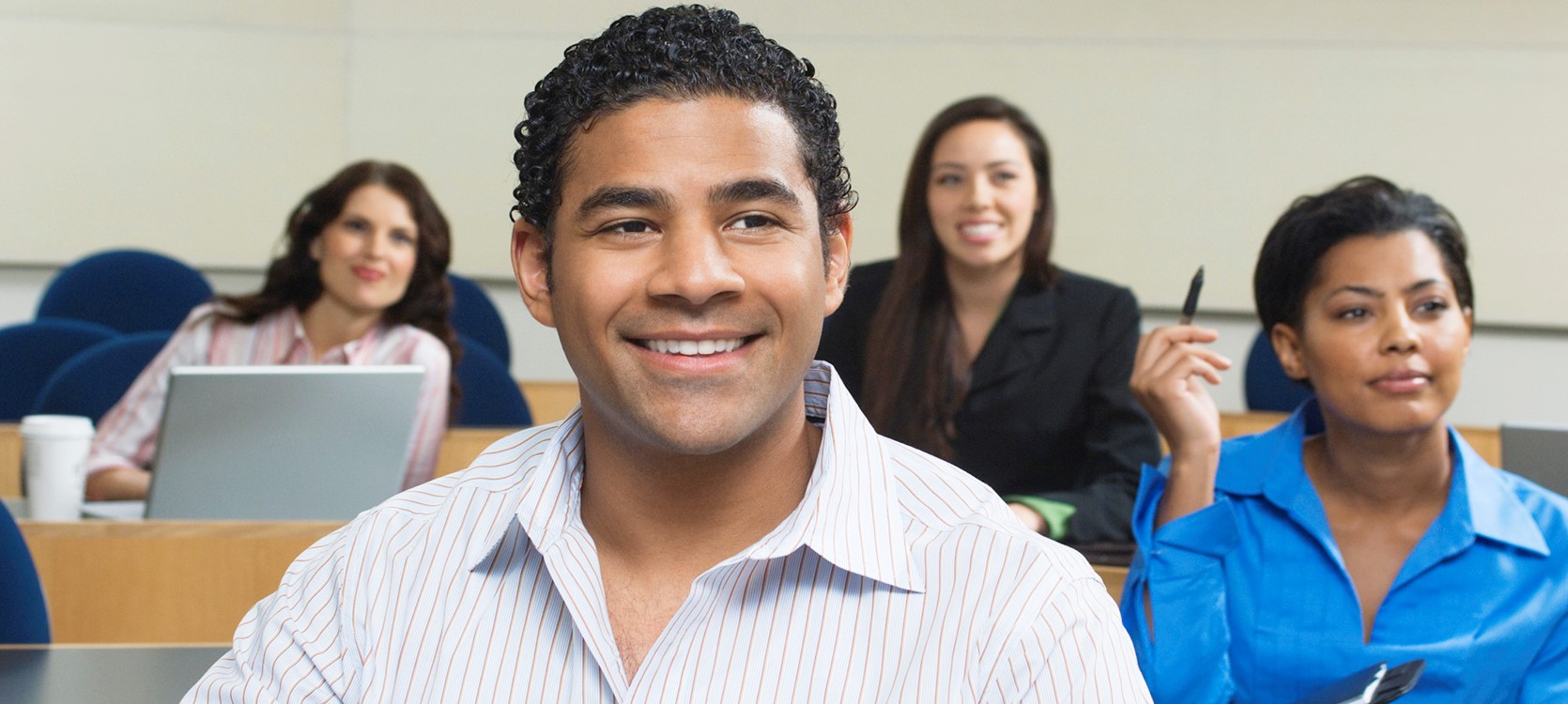 students smiling in class