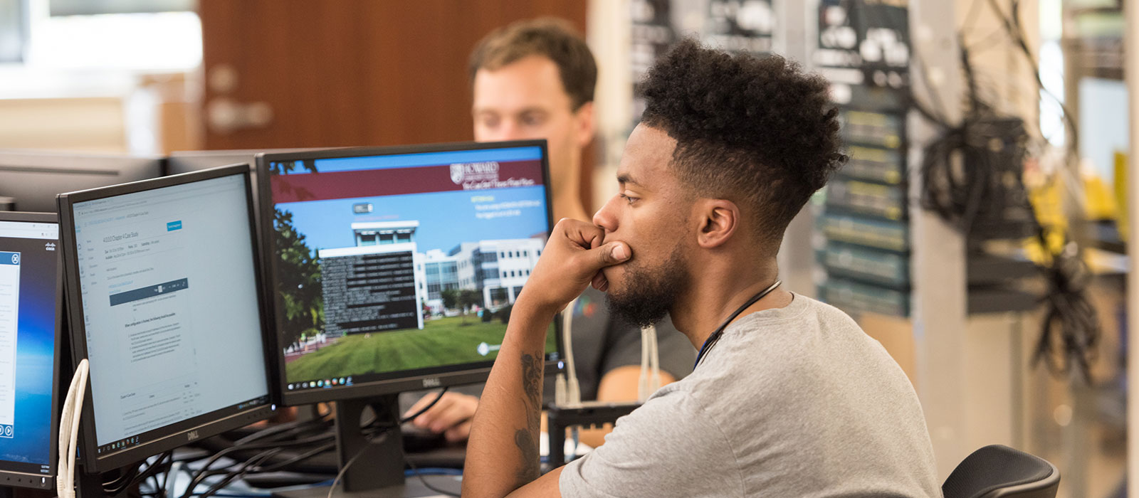 Student sitting in front of a computer