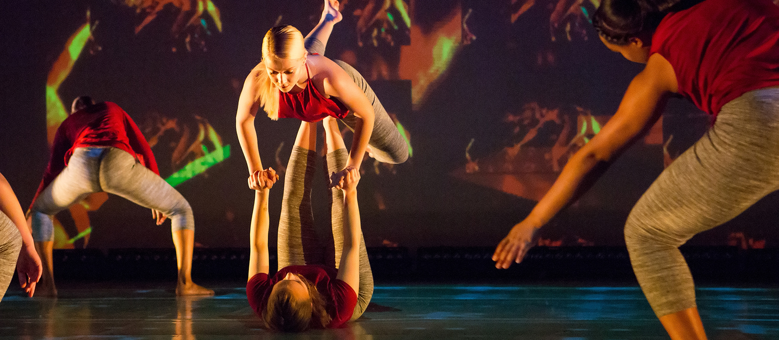 Performers dancing on stage