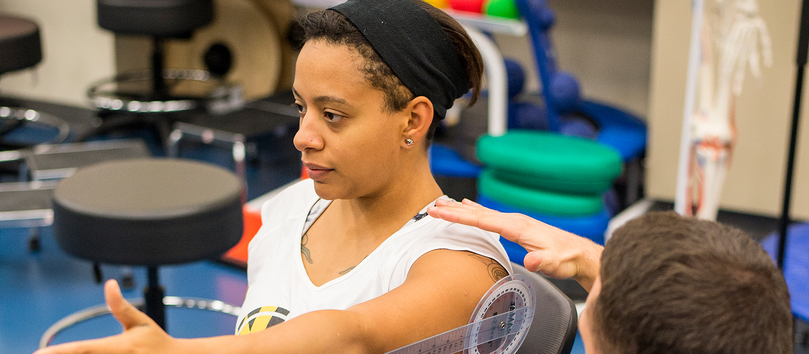 Physical therapist working with a patient