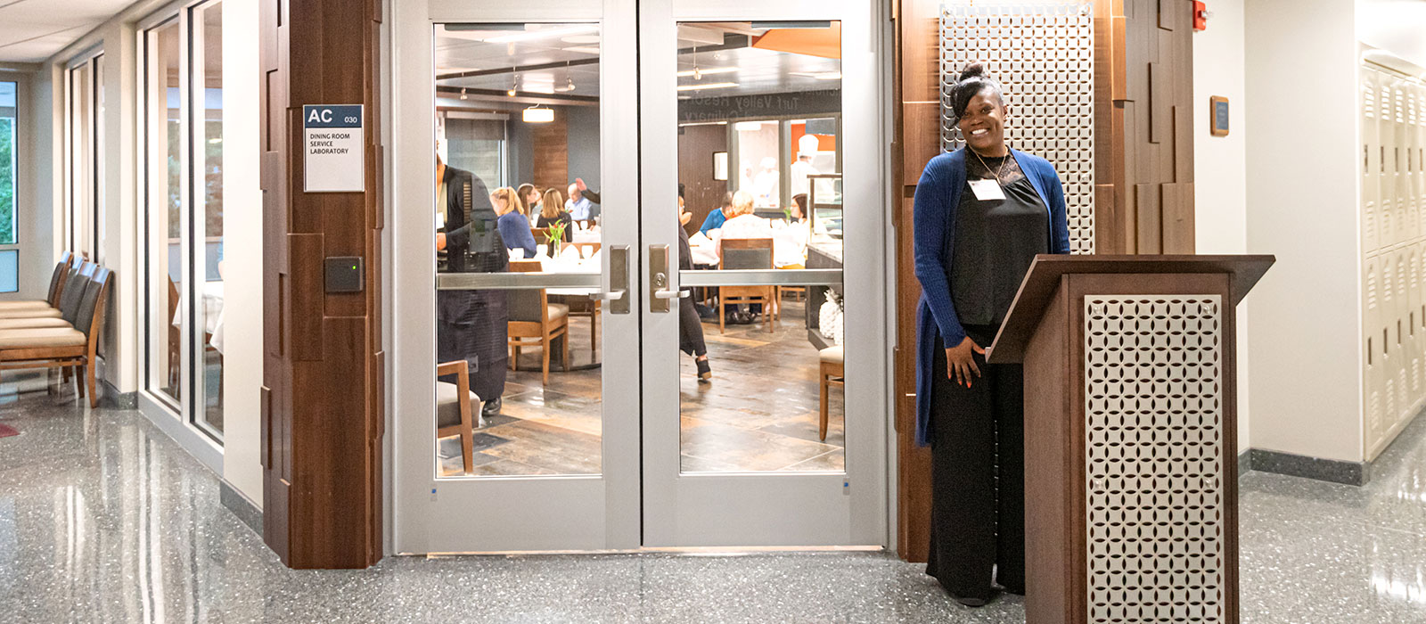 Hostess waiting to greet guests